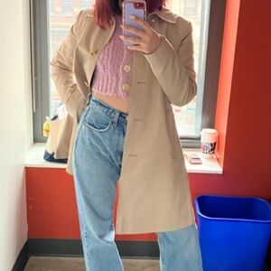 Beige Trench Coat with Pink Sweater and Blue Jeans